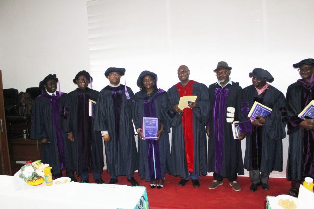 The candidate with the members of the jury