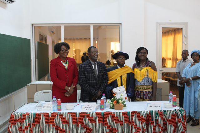 The candidate with the members of the jury
