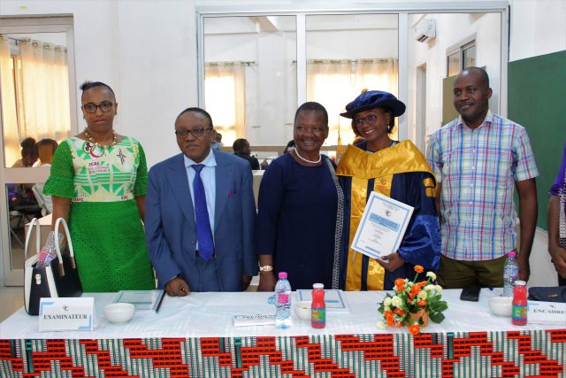 The candidate with the members of the jury