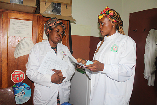 Dr Glwadys Cheteug from CRID revising the SOPs with Rev. Sister Tata Relindis, matron of the St Joseph's clinic